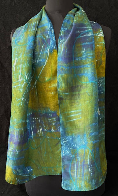 Silk scarf hand printed in in blues, greens, gold
