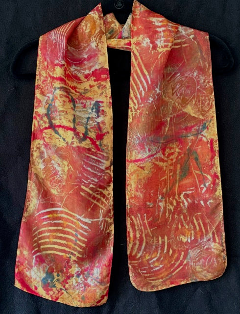 Silk scarf in gold, rust and red