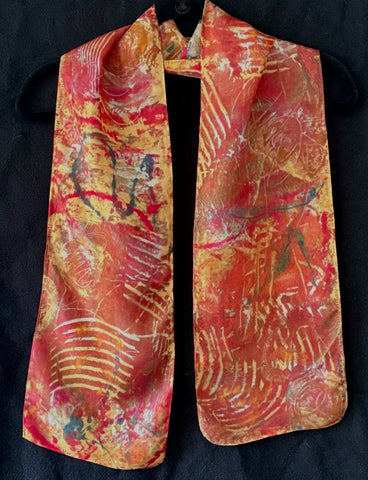 Silk scarf in gold, rust and red