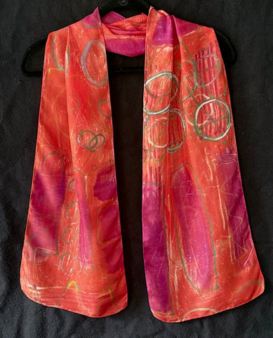 Silk scarf in red with olive scribbles