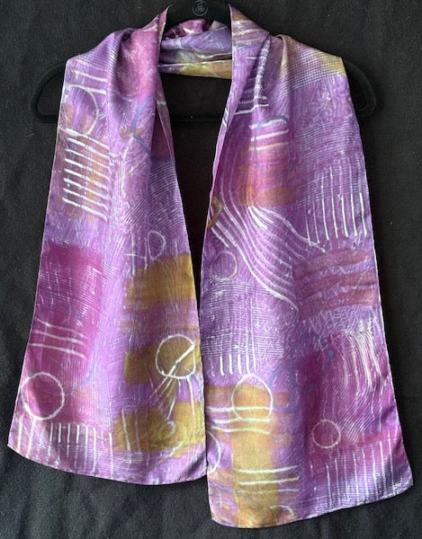 Silk scarf in olive with red and purple patterns