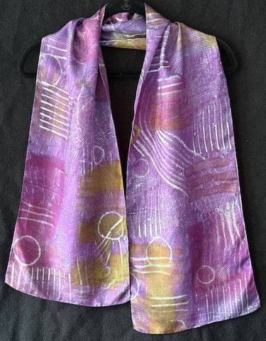 Silk scarf in olive with red and purple patterns