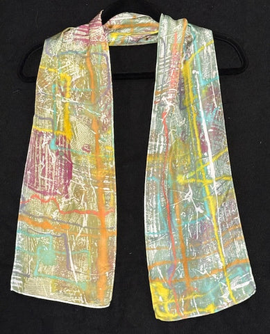 Silk scarf in olive with multi color abstract paterns